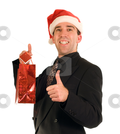 To use this stock image in your creative project, please select the size you need over to the right and click the "Add to Cart" button.
Your downloaded image will come with the Cutcaster watermark removed so don’t worry about the watermark you see on this page. Businessman And His Gift stock photo, A businessman holding his Christmas gift isolated againt a white background by Richard Nelson
