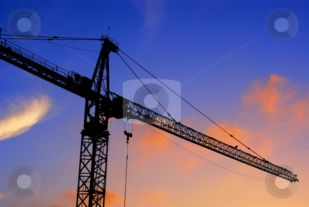 To use this stock image in your creative project, please select the size you need over to the right and click the "Add to Cart" button.
Your downloaded image will come with the Cutcaster watermark removed so don’t worry about the watermark you see on this page. Construction crane at sunset stock photo, Construction crane at sunset by Craig Steven Thrasher