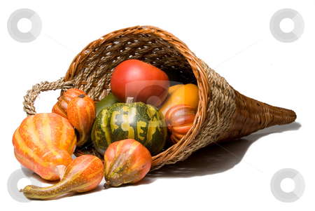 To use this stock image in your creative project, please select the size you need over to the right and click the "Add to Cart" button.
Your downloaded image will come with the Cutcaster watermark removed so don’t worry about the watermark you see on this page. Cornucopia stock photo, The traditional Thanksgiving harvest celebration wicker cornucopia. by Robert Byron