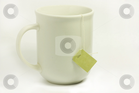 To use this stock image in your creative project, please select the size you need over to the right and click the "Add to Cart" button.
Your downloaded image will come with the Cutcaster watermark removed so don’t worry about the watermark you see on this page. Tea Mug with Tag stock photo, White mug with tea tag hanging down the side. by Julie Bentz