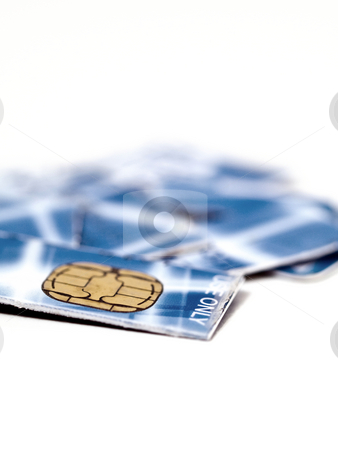 To use this stock image in your creative project, please select the size you need over to the right and click the "Add to Cart" button.
Your downloaded image will come with the Cutcaster watermark removed so don’t worry about the watermark you see on this page. Credit card in pieces stock photo, Credit card cut in pieces on reflective white surface by Laurent Dambies