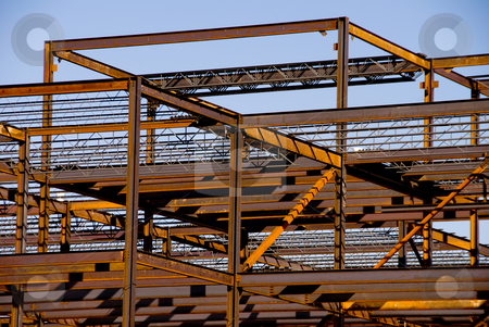 To use this stock image in your creative project, please select the size you need over to the right and click the "Add to Cart" button.
Your downloaded image will come with the Cutcaster watermark removed so don’t worry about the watermark you see on this page. Steel Building Frame Construction stock photo, The steel frame of a building under construction. by Robert Byron