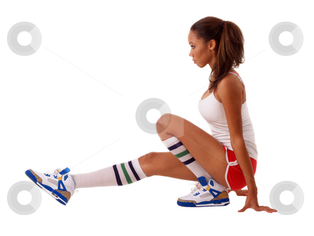 To use this stock image in your creative project, please select the size you need over to the right and click the "Add to Cart" button.
Your downloaded image will come with the Cutcaster watermark removed so don’t worry about the watermark you see on this page. Young black woman stretching out in shorts stock photo, Young black woman in red shorts stretching out by Jeff Cleveland