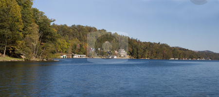 To use this stock image in your creative project, please select the size you need over to the right and click the "Add to Cart" button.
Your downloaded image will come with the Cutcaster watermark removed so don’t worry about the watermark you see on this page. Lake lure panoramic stock photo, Fall panoramic view of Lake Lure in North Carolina by Lee Barnwell