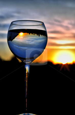 To use this stock image in your creative project, please select the size you need over to the right and click the "Add to Cart" button.
Your downloaded image will come with the Cutcaster watermark removed so don’t worry about the watermark you see on this page. Cheers Mr Sun stock photo, Reflection of Sun in a Wine Goblet, O'Fallon, Missouri by Bibhash Chaudhuri