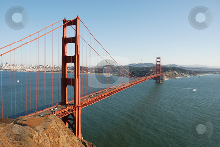 To use this stock image in your creative project, please select the size you need over to the right and click the "Add to Cart" button.
Your downloaded image will come with the Cutcaster watermark removed so don’t worry about the watermark you see on this page. Golden Gate stock photo, Golden gate in october afternoon light with clear sky by Ivan Paunovic
