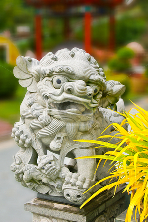 To use this stock image in your creative project, please select the size you need over to the right and click the "Add to Cart" button.
Your downloaded image will come with the Cutcaster watermark removed so don’t worry about the watermark you see on this page. Asian religious lion stock photo, Grey stone religious asian lion with a out of focus background by Karin Claus