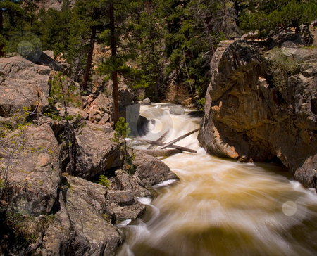 To use this stock image in your creative project, please select the size you need over to the right and click the "Add to Cart" button.
Your downloaded image will come with the Cutcaster watermark removed so don’t worry about the watermark you see on this page. The Pool Rapids stock photo, The Pool rapids on the Big Thompson River in Colorado by John McLaird