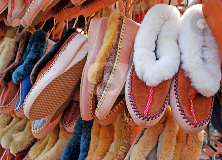 To use this stock image in your creative project, please select the size you need over to the right and click the "Add to Cart" button.
Your downloaded image will come with the Cutcaster watermark removed so don’t worry about the watermark you see on this page. Slippers stock photo, Various comfortable home shoes keeping warm hanging by Julija Sapic