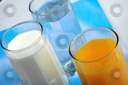 To use this stock image in your creative project, please select the size you need over to the right and click the "Add to Cart" button.
Your downloaded image will come with the Cutcaster watermark removed so don’t worry about the watermark you see on this page. Healthy drink stock photo, Three glasses with water, milk and juice closeup by Julija Sapic