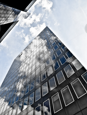To use this stock image in your creative project, please select the size you need over to the right and click the "Add to Cart" button.
Your downloaded image will come with the Cutcaster watermark removed so don’t worry about the watermark you see on this page. Blue office building stock photo, Blue office building with clouds reflection by Laurent Dambies