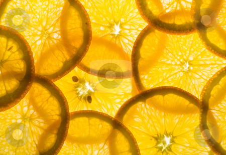 To use this stock image in your creative project, please select the size you need over to the right and click the "Add to Cart" button.
Your downloaded image will come with the Cutcaster watermark removed so don’t worry about the watermark you see on this page. Sliced Orange stock photo, Backlit pieces of sliced orange - healthy eating by Petr Koudelka