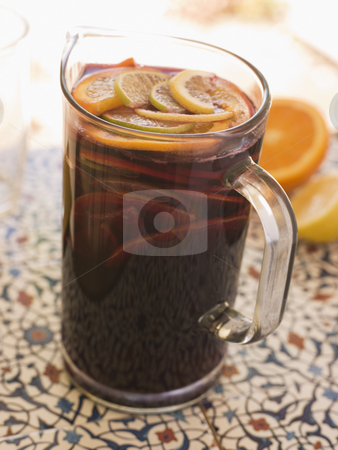 To use this stock image in your creative project, please select the size you need over to the right and click the "Add to Cart" button.
Your downloaded image will come with the Cutcaster watermark removed so don’t worry about the watermark you see on this page. Jug of Sangria stock photo, by Monkey Business Images