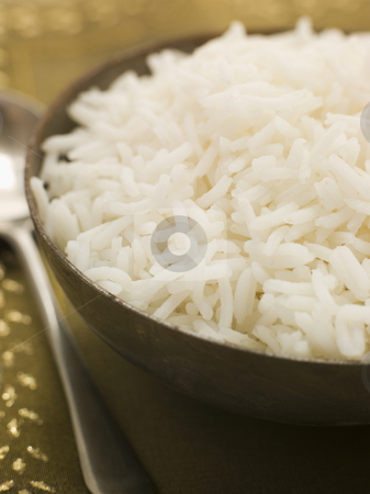 To use this stock image in your creative project, please select the size you need over to the right and click the "Add to Cart" button.
Your downloaded image will come with the Cutcaster watermark removed so don’t worry about the watermark you see on this page. Bowl of Plain Boiled Basmati Rice stock photo, Bowl of Plain Boiled Basmati Rice with serving spoon by Monkey Business Images