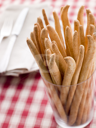 To use this stock image in your creative project, please select the size you need over to the right and click the "Add to Cart" button.
Your downloaded image will come with the Cutcaster watermark removed so don’t worry about the watermark you see on this page. Grissini Bread Sticks stock photo, Close up of Grissini Bread Sticks with cutlery by Monkey Business Images
