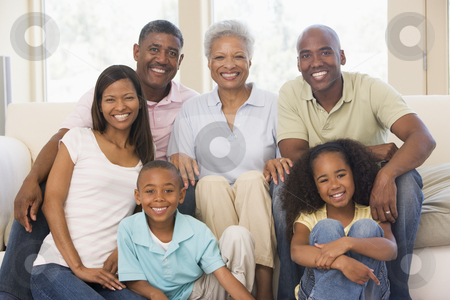 To use this stock image in your creative project, please select the size you need over to the right and click the "Add to Cart" button.
Your downloaded image will come with the Cutcaster watermark removed so don’t worry about the watermark you see on this page. Extended family in living room smiling stock photo, by Monkey Business Images