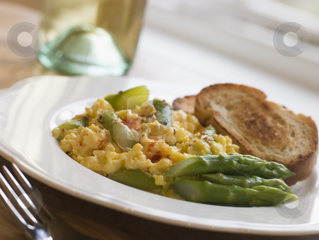 To use this stock image in your creative project, please select the size you need over to the right and click the "Add to Cart" button.
Your downloaded image will come with the Cutcaster watermark removed so don’t worry about the watermark you see on this page. Scrambled Egg and Asparagus with Toasts stock photo, by Monkey Business Images