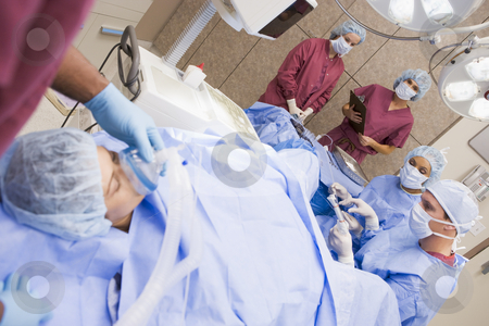 To use this stock image in your creative project, please select the size you need over to the right and click the "Add to Cart" button.
Your downloaded image will come with the Cutcaster watermark removed so don’t worry about the watermark you see on this page. Patient undergoing egg retrieval procedure stock photo, Patient undergoing egg retrieval procedure in theatre by Monkey Business Images