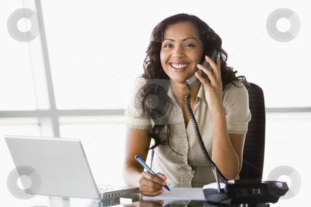 To use this stock image in your creative project, please select the size you need over to the right and click the "Add to Cart" button.
Your downloaded image will come with the Cutcaster watermark removed so don’t worry about the watermark you see on this page. Businesswoman taking telephone call stock photo, Businesswoman taking telephone call in office by Monkey Business Images