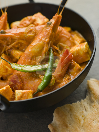 To use this stock image in your creative project, please select the size you need over to the right and click the "Add to Cart" button.
Your downloaded image will come with the Cutcaster watermark removed so don’t worry about the watermark you see on this page. Chilli Tiger Prawns and Paneer Cheese stock photo, Pan of Chilli Tiger Prawns and Paneer Cheese by Monkey Business Images