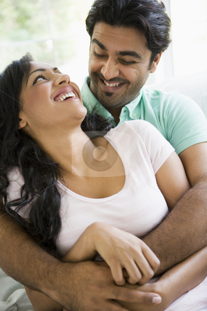 To use this stock image in your creative project, please select the size you need over to the right and click the "Add to Cart" button.
Your downloaded image will come with the Cutcaster watermark removed so don’t worry about the watermark you see on this page. A Middle Eastern couple cuddling stock photo, by Monkey Business Images