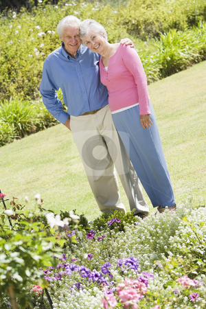 To use this stock image in your creative project, please select the size you need over to the right and click the "Add to Cart" button.
Your downloaded image will come with the Cutcaster watermark removed so don’t worry about the watermark you see on this page. Senior couple standing in garden stock photo, Senior couple standing in garden admiring flowerbed by Monkey Business Images