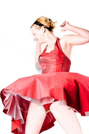 To use this stock image in your creative project, please select the size you need over to the right and click the "Add to Cart" button.
Your downloaded image will come with the Cutcaster watermark removed so don’t worry about the watermark you see on this page. Funny girl in red gala dress dancing stock photo, Girl in red gala dress making fun by Frenk and Danielle Kaufmann