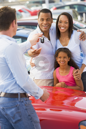 To use this stock image in your creative project, please select the size you need over to the right and click the "Add to Cart" button.
Your downloaded image will come with the Cutcaster watermark removed so don’t worry about the watermark you see on this page. Young family picking up new car stock photo, Family picking up new car from saleman by Monkey Business Images