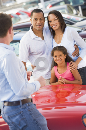 To use this stock image in your creative project, please select the size you need over to the right and click the "Add to Cart" button.
Your downloaded image will come with the Cutcaster watermark removed so don’t worry about the watermark you see on this page. Young family collecting new car stock photo, Young family collecting new car from salesman by Monkey Business Images