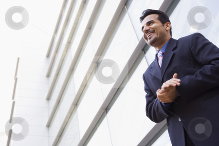 To use this stock image in your creative project, please select the size you need over to the right and click the "Add to Cart" button.
Your downloaded image will come with the Cutcaster watermark removed so don’t worry about the watermark you see on this page. Businessman standing outside office building stock photo, Businessman standing outside modern office building by Monkey Business Images