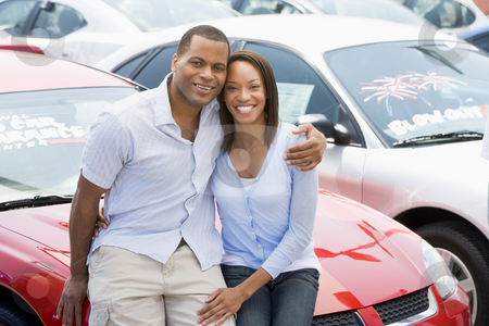To use this stock image in your creative project, please select the size you need over to the right and click the "Add to Cart" button.
Your downloaded image will come with the Cutcaster watermark removed so don’t worry about the watermark you see on this page. Couple looking at new cars stock photo, Couple looking at new cars on lot by Monkey Business Images