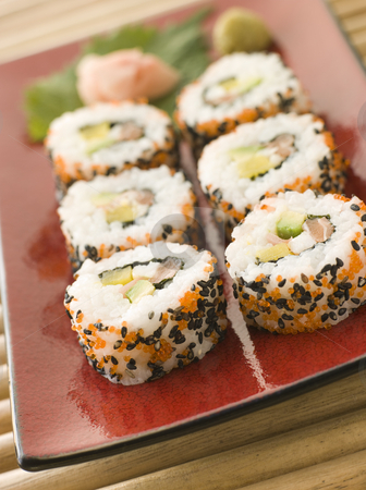 To use this stock image in your creative project, please select the size you need over to the right and click the "Add to Cart" button.
Your downloaded image will come with the Cutcaster watermark removed so don’t worry about the watermark you see on this page. Inside-out Sushi Rolls stock photo, Plate of Inside-out Sushi Rolls decorated with roe and sesame seeds by Monkey Business Images