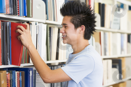 To use this stock image in your creative project, please select the size you need over to the right and click the "Add to Cart" button.
Your downloaded image will come with the Cutcaster watermark removed so don’t worry about the watermark you see on this page. University student selecting book from library shelf stock photo, Male university student selecting book from library by Monkey Business Images