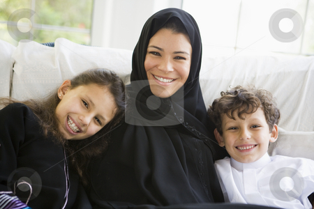 To use this stock image in your creative project, please select the size you need over to the right and click the "Add to Cart" button.
Your downloaded image will come with the Cutcaster watermark removed so don’t worry about the watermark you see on this page. A Middle Eastern woman with her children stock photo, by Monkey Business Images