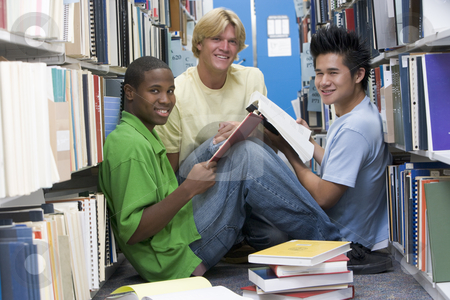 To use this stock image in your creative project, please select the size you need over to the right and click the "Add to Cart" button.
Your downloaded image will come with the Cutcaster watermark removed so don’t worry about the watermark you see on this page. Group of university students working in library stock photo, Group of three male students sitting on floor of library surrounded by books by Monkey Business Images