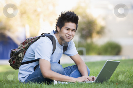 To use this stock image in your creative project, please select the size you need over to the right and click the "Add to Cart" button.
Your downloaded image will come with the Cutcaster watermark removed so don’t worry about the watermark you see on this page. University student with laptop computer stock photo, Male student sitting on grass with laptop by Monkey Business Images
