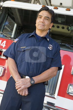 To use this stock image in your creative project, please select the size you need over to the right and click the "Add to Cart" button.
Your downloaded image will come with the Cutcaster watermark removed so don’t worry about the watermark you see on this page. Portrait of a firefighter by a fire engine stock photo, by Monkey Business Images