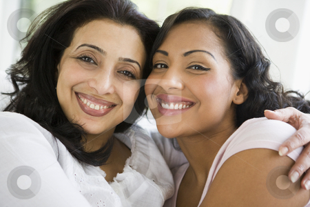 To use this stock image in your creative project, please select the size you need over to the right and click the "Add to Cart" button.
Your downloaded image will come with the Cutcaster watermark removed so don’t worry about the watermark you see on this page. A Middle Eastern woman with her daughter-in-law stock photo, by Monkey Business Images