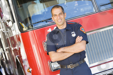 To use this stock image in your creative project, please select the size you need over to the right and click the "Add to Cart" button.
Your downloaded image will come with the Cutcaster watermark removed so don’t worry about the watermark you see on this page. Portrait of a firefighter by a fire engine stock photo, by Monkey Business Images
