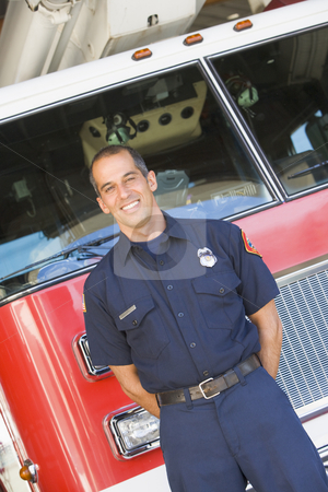 To use this stock image in your creative project, please select the size you need over to the right and click the "Add to Cart" button.
Your downloaded image will come with the Cutcaster watermark removed so don’t worry about the watermark you see on this page. Portrait of a firefighter by a fire engine stock photo, by Monkey Business Images