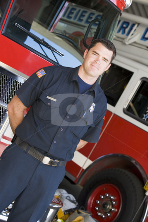 To use this stock image in your creative project, please select the size you need over to the right and click the "Add to Cart" button.
Your downloaded image will come with the Cutcaster watermark removed so don’t worry about the watermark you see on this page. Portrait of a firefighter by a fire engine stock photo, by Monkey Business Images