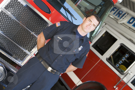 To use this stock image in your creative project, please select the size you need over to the right and click the "Add to Cart" button.
Your downloaded image will come with the Cutcaster watermark removed so don’t worry about the watermark you see on this page. Portrait of a firefighter by a fire engine stock photo, by Monkey Business Images