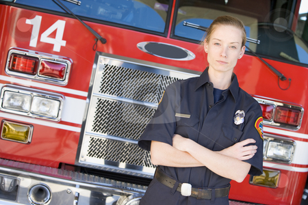 To use this stock image in your creative project, please select the size you need over to the right and click the "Add to Cart" button.
Your downloaded image will come with the Cutcaster watermark removed so don’t worry about the watermark you see on this page. Portrait of a firefighter by a fire engine stock photo, by Monkey Business Images