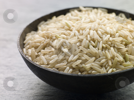To use this stock image in your creative project, please select the size you need over to the right and click the "Add to Cart" button.
Your downloaded image will come with the Cutcaster watermark removed so don’t worry about the watermark you see on this page. Uncooked Basmati Rice stock photo, Bowl of Uncooked Basmati Rice by Monkey Business Images