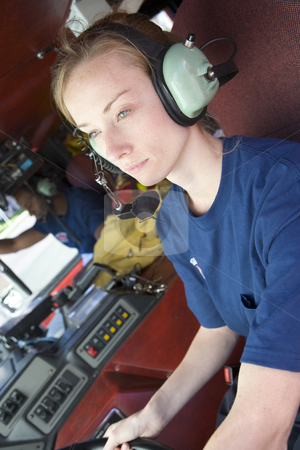 To use this stock image in your creative project, please select the size you need over to the right and click the "Add to Cart" button.
Your downloaded image will come with the Cutcaster watermark removed so don’t worry about the watermark you see on this page. A firefighter driving a fire engine stock photo, by Monkey Business Images