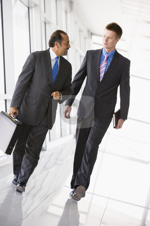 To use this stock image in your creative project, please select the size you need over to the right and click the "Add to Cart" button.
Your downloaded image will come with the Cutcaster watermark removed so don’t worry about the watermark you see on this page. Businessmen walking through lobby stock photo, Businessmen walking through office lobby by Monkey Business Images