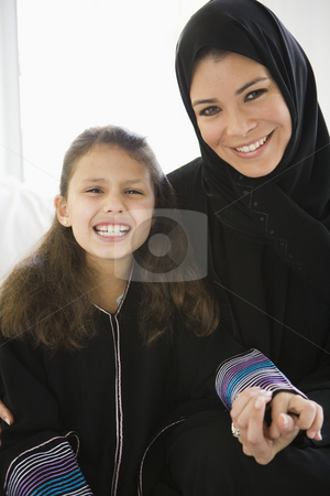 To use this stock image in your creative project, please select the size you need over to the right and click the "Add to Cart" button.
Your downloaded image will come with the Cutcaster watermark removed so don’t worry about the watermark you see on this page. A Middle Eastern woman with her daughter stock photo, by Monkey Business Images