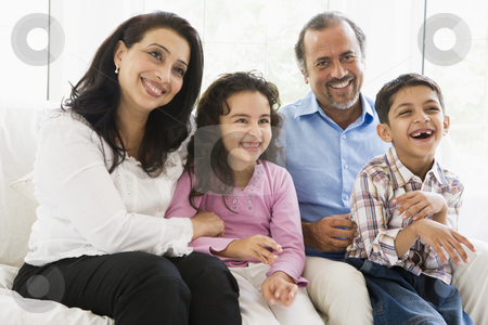 To use this stock image in your creative project, please select the size you need over to the right and click the "Add to Cart" button.
Your downloaded image will come with the Cutcaster watermark removed so don’t worry about the watermark you see on this page. A Middle Eastern couple with their grandchildren stock photo, by Monkey Business Images