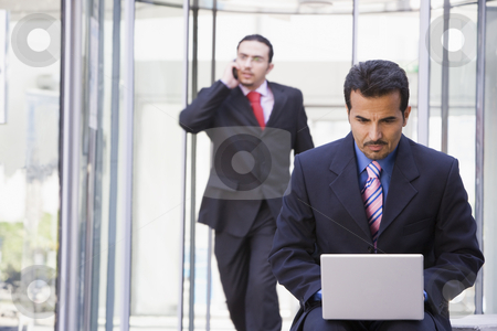 To use this stock image in your creative project, please select the size you need over to the right and click the "Add to Cart" button.
Your downloaded image will come with the Cutcaster watermark removed so don’t worry about the watermark you see on this page. Businessman working at laptop outside stock photo, Businessman working at laptop outside office by Monkey Business Images