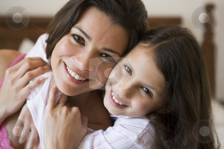 To use this stock image in your creative project, please select the size you need over to the right and click the "Add to Cart" button.
Your downloaded image will come with the Cutcaster watermark removed so don’t worry about the watermark you see on this page. A Middle Eastern woman with her daughter stock photo, by Monkey Business Images